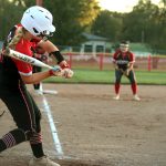 With her team trailing St. Joseph: Benton 6-5 with two outs and runners at second and third base in the bottom of the sixth inning, senior catcher Charley Peniston of the 2025 Chillicothe High School softball Lady Hornets starts the swing which would produce a 2-runs single to right-center field that capped a 6-runs, 2-outs rally and give her team a 7-6 lead. Winning by that score a few minutes later, Chillicothe clinched its sixth Midland Empire Conference championship in a row. (PAUL STURM/C-T PHOTO)