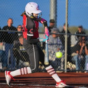 Although by no means a 1-girl gang, 2025 Chillicothe High School softball Lady Hornets junior pitcher Landry Marsh proved too hard for Savannah to handle when she batted in the Oct. 20 championship game of the Class 3 District 8 Tournament at Excelsior Springs. About to clout a low pitch hard and far over the left-center field fence for a 3-runs home run in the second inning, Marsh ended the game three for three at bat with three RBI, three runs scored, two walks, and two stolen bases. In the bottom of the ninth inning, her second walk and second steal set her up to score the game-ending run in CHS’ 6-5 victory on Hayden Hansen’s long single to deep left-center field. After a slow start throwing, she also shut out Savannah over the final five innings to buy time for her team to get the winning run that sends them into state-tournament play Saturday. (BUTCH SHAFFER/C-T PHOTO)