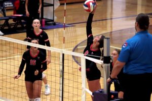 Senior Ava Leamer strikes a spike attempt as teammates (from right) Lyla Beetsma, Emerson Staton (16) and Clara Fisher watch during the 2025 Chillicothe High School Lady HornetsÕ Class 3 District 16 volleyball tournament championship match against Savannah at St. JosephÕs Bishop LeBlond Memorial High School last Saturday (Oct. 25). After seemingly having a path to their programÕs first district title and state-tournament berth ever, the Lady Hornets were overtaken by determined defending champion and No. 1 seed Savannah and lost in four games, ending the CHS season with a magnificent 30-5 record, best-ever in the programÕs 32 seasons of play. (PAUL STURM/C-T PHOTO)
